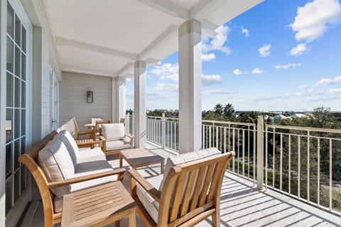 Lounge in the sun on the breezy, furnished balcony.