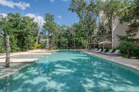 Shared pool with outdoor furniture 