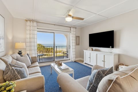 Gorgeous Living Room Featuring a Flat Screen TV, Plush Seating, and Sliders that Lead to a Beautiful Private Balcony with Stunning Oceanfront Views (Sleeper Sofa)