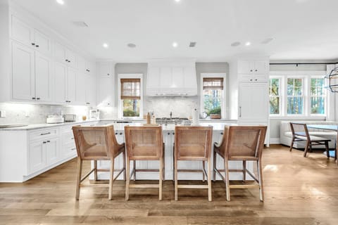 Large island includes seating for four.