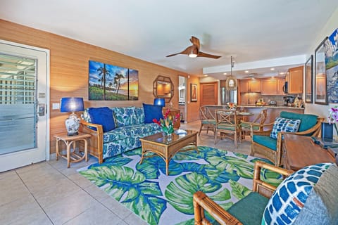 Gather in a spacious living area with island-inspired furnishings and a seamless indoor-outdoor flow.