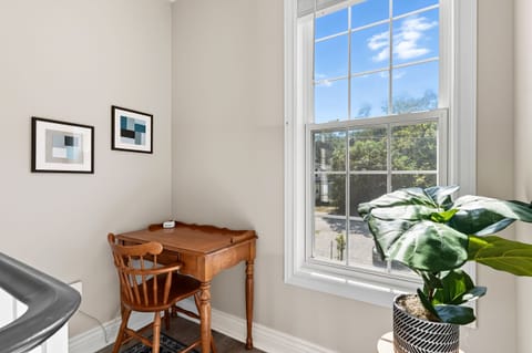 Need to check in with work or plan your day? This sunny workspace is quiet and inspiring.