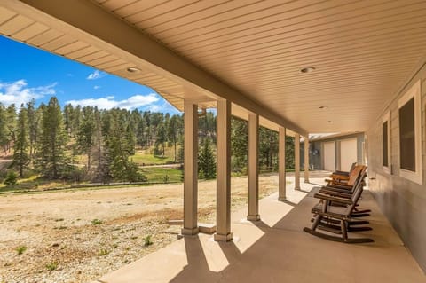 Front porch with views of the property