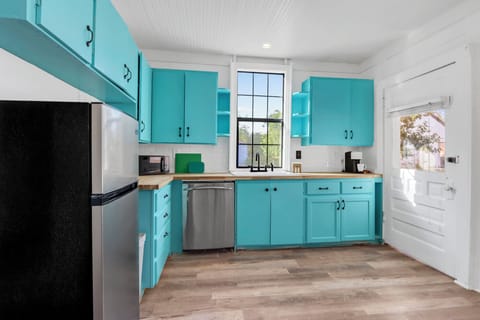 The kitchen is conveniently adjacent to the dining