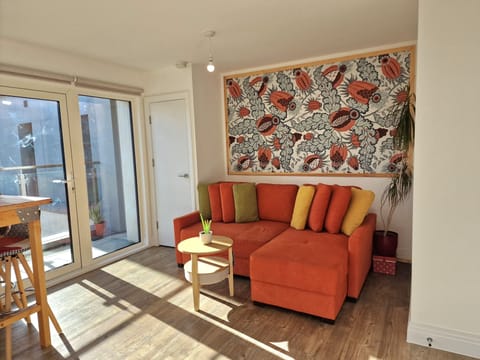 Bright living space with double sofa bed