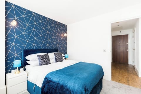 Rest easy in the spacious and serene primary bedroom.