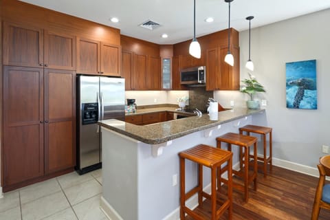 Cook with ease in a fully equipped kitchen and enjoy the coffee at the breakfast bar
