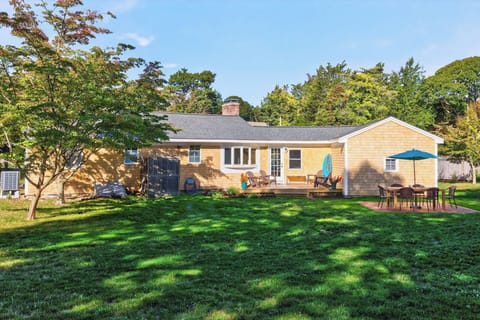 Large backyard for playing cornhole, croquet, etc