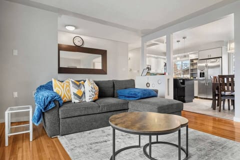Living room with a cozy sectional and a smart TV.