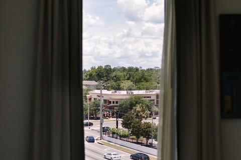 Take in the vibrant city view from your modern retreat at Hotel Eleo, perfectly situated near the University of Florida.