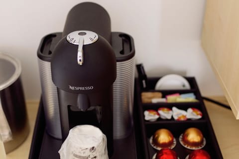A sleek Nespresso machine awaits, promising the perfect brew to kickstart your day in Gainesville.