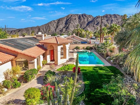 South-facing backyard with heated saltwater pool and stunning mountain views.