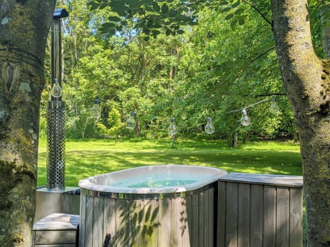 Your own festoon lit wood fired hot tub in the garden of your lodge | The Apple Bobber - The Firs Suffolk, Cratfield, near Laxfield