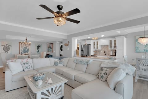 Relax in the living room at Marina Towers 704 after a long day in the sun. 