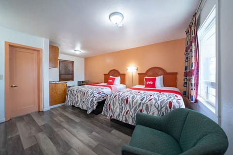 Gather and relax in a spacious double-bed room layout.
