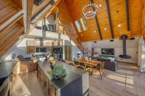 Channel your inner chef in the fully-equipped gourmet kitchen, complete with high-end appliances and plenty of prep space. It's the ideal setting for crafting anything from hearty breakfasts to elegant dinners.