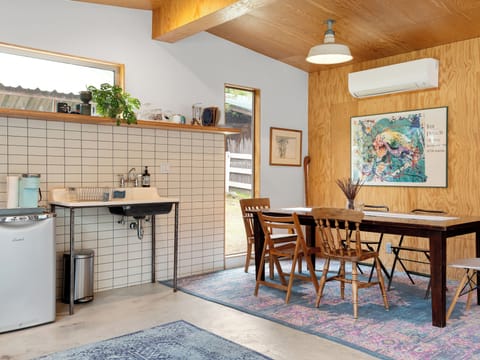 Guest house kitchenette (induction hot plate, gas burners on vintage stove)