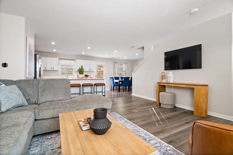 Smart tv and cozy seating in living area