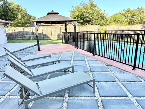 Sun bathing by the pool side