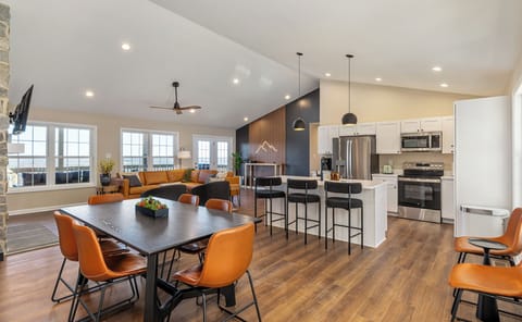 The state-of-the-art kitchen and dining area offer plenty of room to comfortably host family dinners and are stocked with all the cookware, dishes, utensils, and appliances you will need to cook delicious meals.