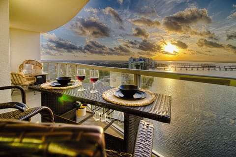 Dinner and wine with a spectacular sunset and water views from the balcony.