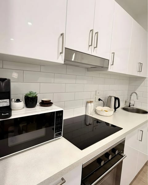 Well-equipped kitchenette with essentials for light cooking and longer stays.