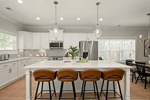 Massive Kitchen Island – Prep meals, serve snacks, or set up your laptop with plenty of space to spread out.