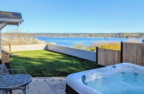 Relax and take in the sweeping views of the Sinclair Inlet and Mount Rainier!