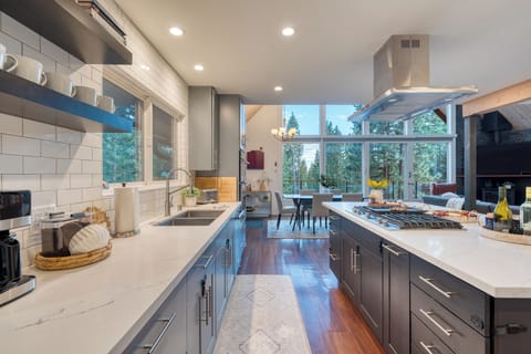 Fully stocked kitchen with ample counter space.
