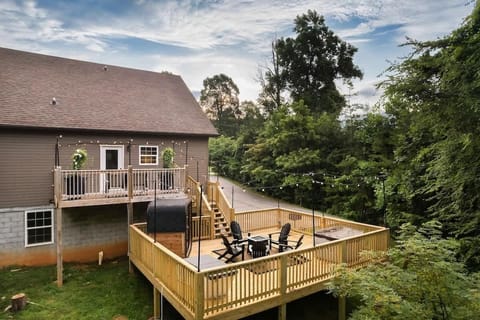 Revel in stunning views while lounging by the fire pit under twinkling lights!