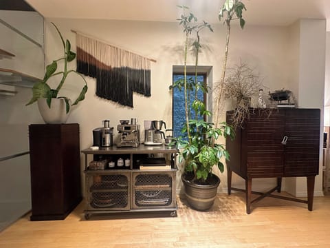 Espresso bar + juicer + Vitamix for morning rituals.