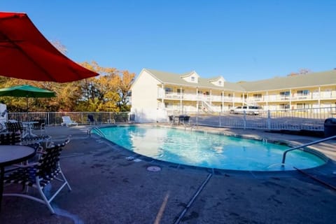 Dive into refreshing sunshine at our sparkling outdoor pool.
