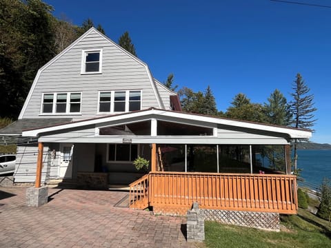 Covered porch at Hatch's Lodge overlooking Otsego Lake