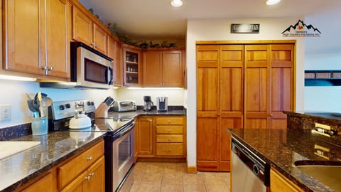 Kitchen with Modern Appliances & Laundry Closet