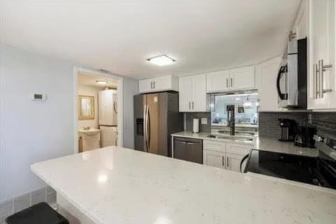 Kitchen and Half Bath with Laundry