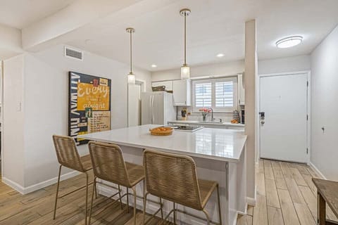 Kitchen with Island and Seating for 3