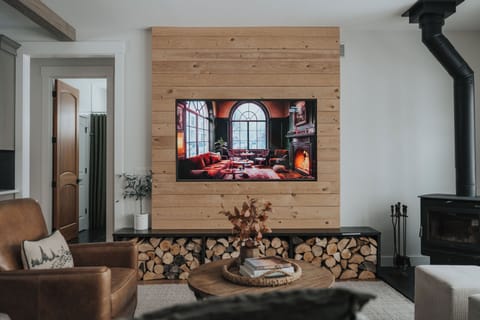 Main floor family room with wood burning stove. Fire wood provided by the host.