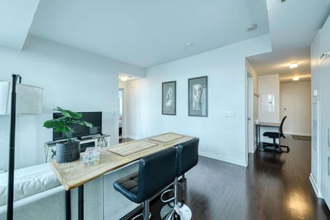 Bright, modern suite with a stylish breakfast bar and dedicated work nook.