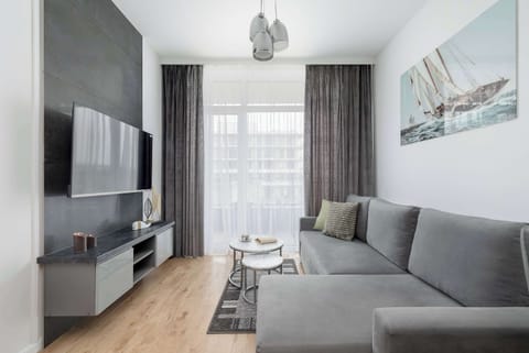 Bright living room with a comfortable sofa and modern décor