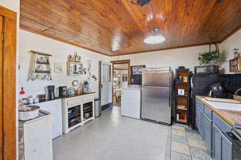 Indoors, Floor, Flooring, Lamp, Appliance
