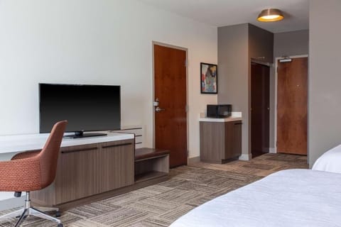 Settle in with a big-screen TV and easy entry access.