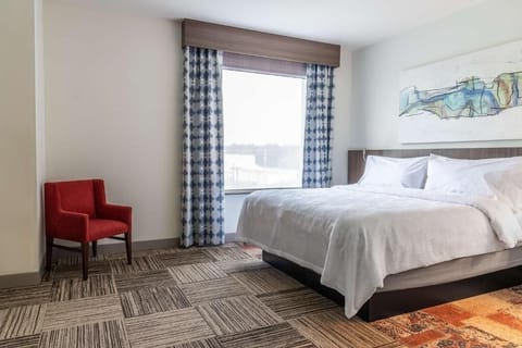 Move effortlessly between sleeping and lounging areas in this suite.