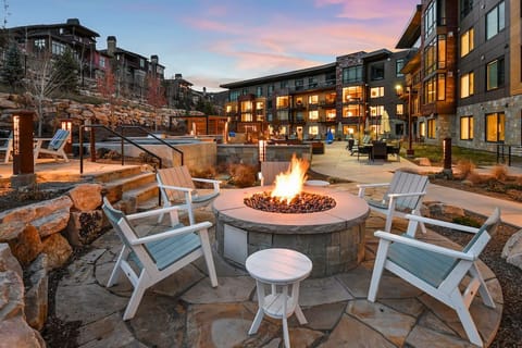 Warm up by the outdoor fire pit with friends and family.
