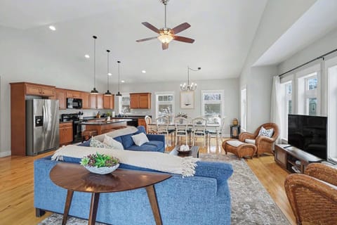 The open-concept layout ensures you never miss a moment of the action between the kitchen and lounge.