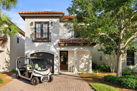 Front of the Home with Private Driveway and 6 Seat Golf Cart