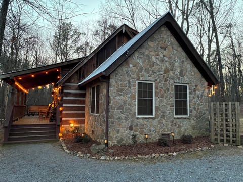 Stone wing, garden bed with newly planted camelias and rhododendrons