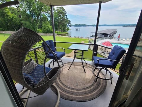 Balcony with a swinging egg chair and a great view!