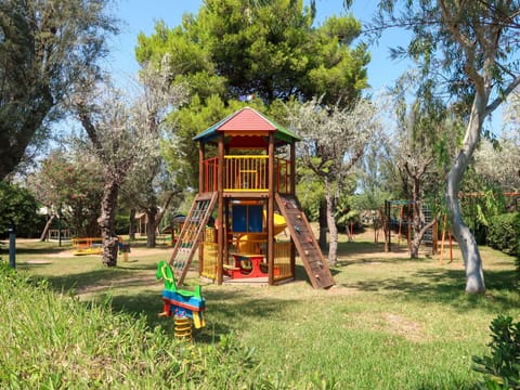 Playground Slide, Outdoor Play Equipment, Shade, Recreation, Leisure, Garden, Chute, Lawn, Park, Landscaping