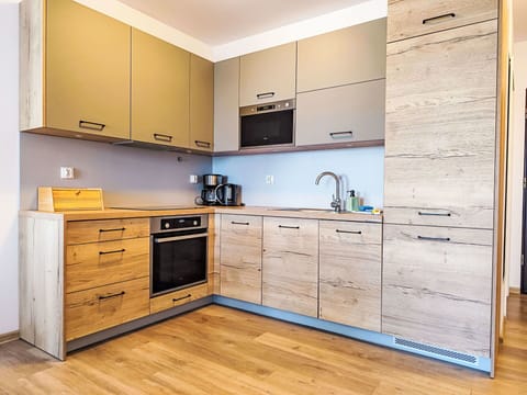 Cabinetry, Furniture, Flooring, Drawer, Wood, Countertop, Interior Design, Cupboard, Floor, Kitchen