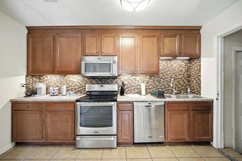 Clean cookspace w/ stainless appliances for effortless dinners